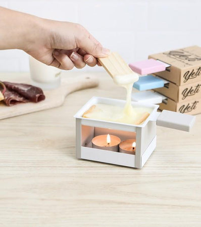 Raclette à la bougie pliable YETI